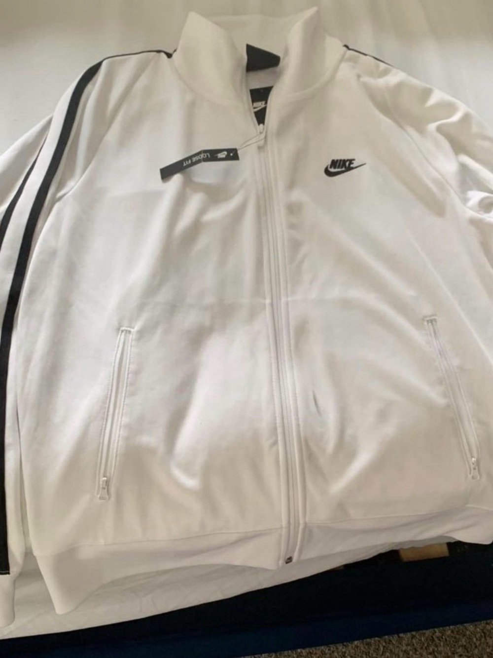 Nike Men’s White Track Jacket with Black Stripe Accents